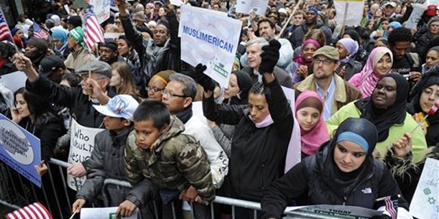 Protesters gather at the 'Today, I Am A Muslim, Too' rally to protest against a planned congressional hearing on the role of Muslims in homegrown terrorism March 6 in New York.