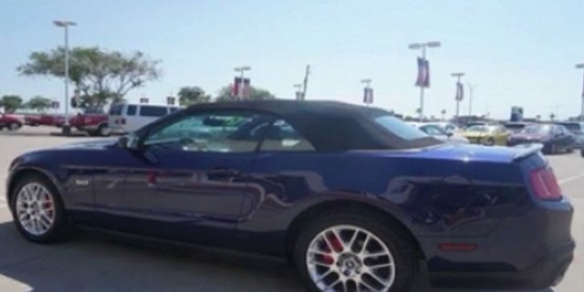 A Florida woman's Mustang convertible was stolen after she stopped to help victims of a car crash.