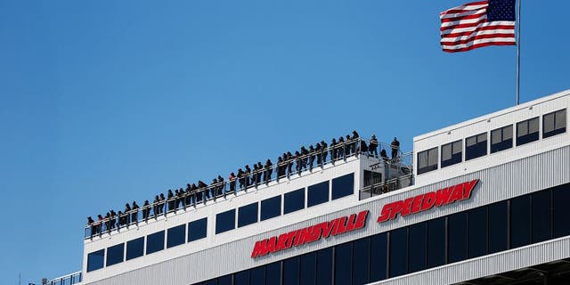 MARTINSVILLE, VA - OCTOBER 30: A general view of spotters on the roof during practice for the NASCAR Camping World Truck Series Kroger 200 at Martinsville Speedway on October 30, 2015 in Martinsville, Virginia. (Photo by Brian Lawdermilk/NASCAR via Getty Images)