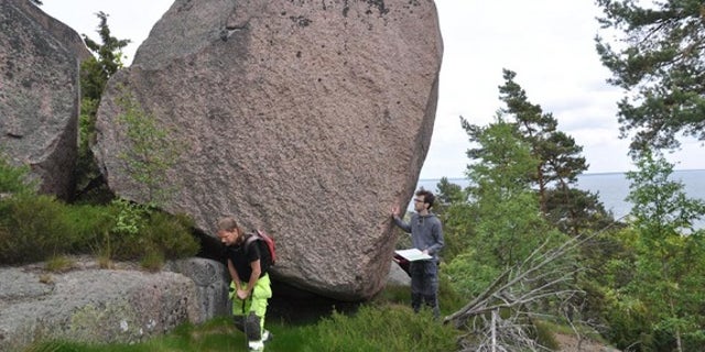 Archaeologists work on the island off Sweden where they discovered evidence of Stone Age rituals. The island has long been linked with tales of witchcraft, supernatural powers and curses.