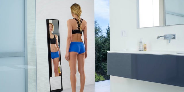 The Naked mirror uses infrared light to scan a person's body and create a 3D model.