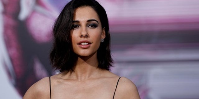 Cast member Naomi Scott poses at the premiere of "Power Rangers" in Los Angeles, California U.S., March 22, 2017. REUTERS/Mario Anzuoni - RC114DF37160