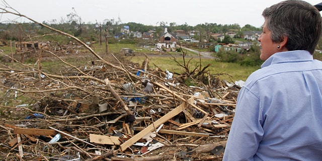 May 1: Homeland Security Secretary Janet Napolitano looks over the destruction where a tornado ripped Pratt City