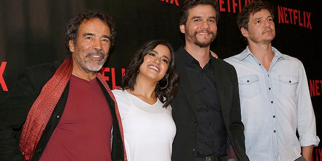 Damian Alcazar, from left to right, who plays the role of a Cali druglord named Gilberto Orejuela in the Netflix series "Narcos", Paulina Gaitan, who plays the character of Pablo Escobar's wife Tata, Wagner Moura, who plays the role of Pablo Escobar, and, Pedro Pascal, who plays the role of a DEA agent named Javier Peña, pose for photos during a media call to promote their second season, in Mexico City, Tuesday, Aug. 16, 2016. "Narcos" the Netflix series about the history of the cocaine route presents the downfall of Pablo Escobar in its second season premiering worldwide on Sept.2. (AP Photo/Marco Ugarte)