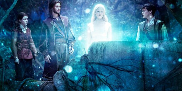 In this film publicity image released by 20th Century Fox, from left, Georgie Henley, Ben Barnes, Laura Brent, and Skandar Keynes are shown in a scene from The Chronicles of Narnia: The Voyage of the Dawn Treader.