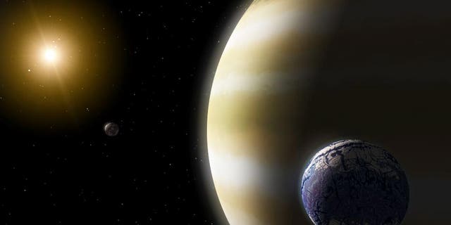 An exomoon circles a gas giant planet in this artist's impression. What happens to exomoons when their planets interact?