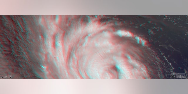 The MISR instrument, flying onboard NASA’s Terra satellite, carries nine cameras that observe Earth at different angles. It takes about seven minutes for all the cameras to observe the same location. This stereo anaglyph shows a 3D view of Florence. You will need red-blue 3D glasses, with the red lens placed over the left eye, to view the effect. The anaglyph shows the high clouds associated with strong thunderstorms in the eyewall of hurricane and individual strong thunderstorms in the outer rain bands. These smaller storms can sometimes spawn tornadoes. (Credit: NASA/GSFC/LaRC/JPL-Caltech, MISR Team)