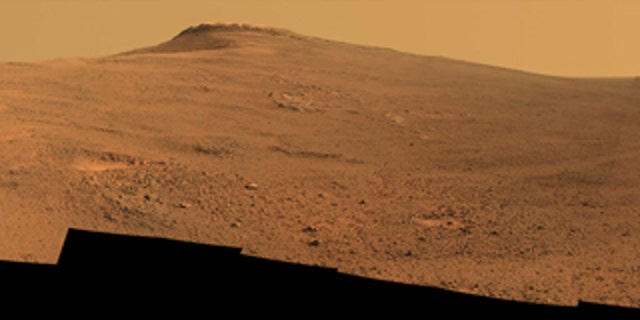 Opportunity's panoramic camera (Pancam) took the component images for this view from a position outside Endeavor Crater during the span of June 7 to June 19, 2017. Toward the right side of this scene is a broad notch in the crest of the western rim of crater.