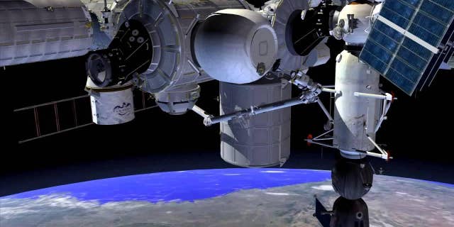 Artist's impression - Inflated BEAM module (balloon structure at top center) berthed to the Tranquility node of ISS (NASA).