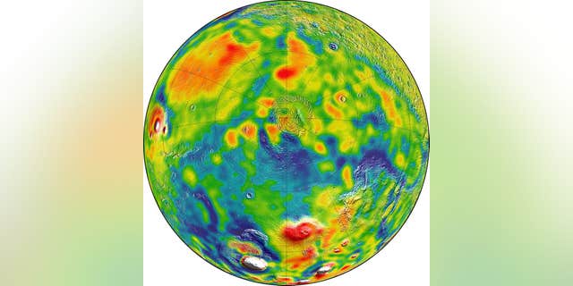 A map of Martian gravity looking down on the North Pole (center). White and red are areas of higher gravity; blue indicates areas of lower gravity. (Credits: MIT/UMBC-CRESST/GSFC)