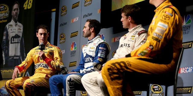 MIAMI BEACH, FL - NOVEMBER 17: (L-R) Joey Logano, driver of the #22 Shell Pennzoil Ford, Jimmie Johnson, driver of the #48 Lowes Chevrolet, Carl Edwards, driver of the #19 Arris Surfboard Toyota, and Kyle Busch, driver of the (18) M&amp;M's Core Toyota, talk to the media during media day for the NASCAR Sprint Cup Series Championship at the Loews Hotel on November 17, 2016 in Miami Beach, Florida. (Photo by Sean Gardner/NASCAR via Getty Images)