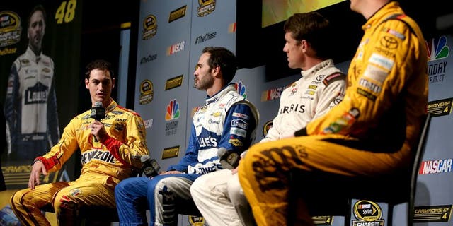 MIAMI BEACH, FL - NOVEMBER 17: (L-R) Joey Logano, driver of the #22 Shell Pennzoil Ford, Jimmie Johnson, driver of the #48 Lowes Chevrolet, Carl Edwards, driver of the #19 Arris Surfboard Toyota, and Kyle Busch, driver of the (18) M&M's Core Toyota, talk to the media during media day for the NASCAR Sprint Cup Series Championship at the Loews Hotel on November 17, 2016 in Miami Beach, Florida. (Photo by Sean Gardner/NASCAR via Getty Images)