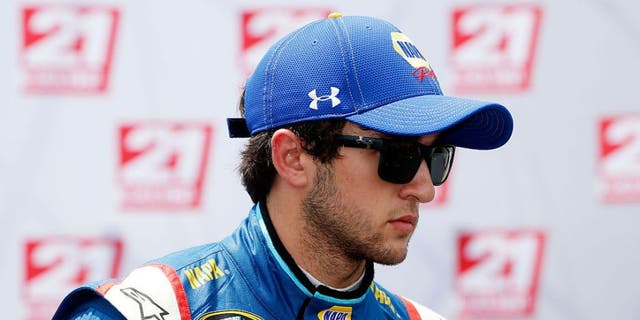 TALLADEGA, AL - APRIL 30: Chase Elliott, driver of the #24 NAPA Auto Parts Chevrolet, celebrates with the 21 Means 21 pole award after qualifying for pole position for the NASCAR Sprint Cup Series GEICO 500 at Talladega Superspeedway on April 30, 2016 in Talladega, Alabama. (Photo by Brian Lawdermilk/Getty Images)