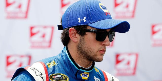 TALLADEGA, AL - APRIL 30: Chase Elliott, driver of the #24 NAPA Auto Parts Chevrolet, celebrates with the 21 Means 21 pole award after qualifying for pole position for the NASCAR Sprint Cup Series GEICO 500 at Talladega Superspeedway on April 30, 2016 in Talladega, Alabama. (Photo by Brian Lawdermilk/Getty Images)