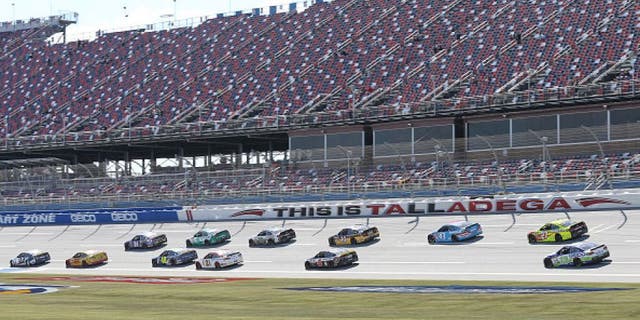 TALLADEGA, AL - OCTOBER 21: Chase Elliott, driver of the #24 NAPA Auto Parts Chevrolet, leads a pack of cars during practice for the NASCAR Sprint Cup Series Hellmann's 500 at Talladega Superspeedway on October 21, 2016 in Talladega, Alabama. (Photo by Jerry Markland/Getty Images)