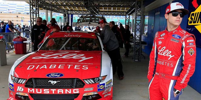 KANSAS CITY, KS - OCTOBER 15: Ryan Reed, driver of the #16 Lilly Diabetes/American Diabetes Association Ford, waits as his car is inspected by NASCAR officials prior to qualifying for the NASCAR XFINITY Series Kansas Lottery 300 at Kansas Speedway on October 15, 2016 in Kansas City, Kansas. (Photo by Chris Trotman/Getty Images)