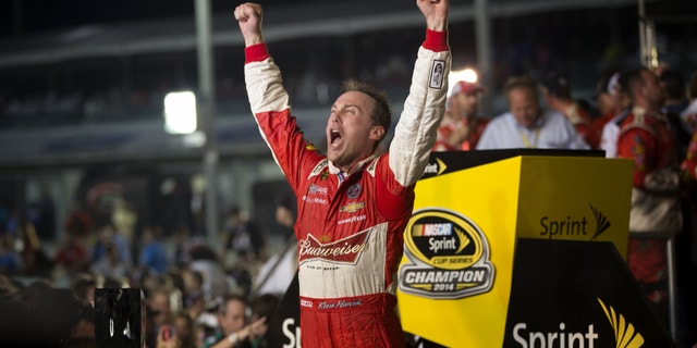 Nov. 16, 2014: Kevin Harvick celebrates after winning the NASCAR Sprint Cup championship series auto race.