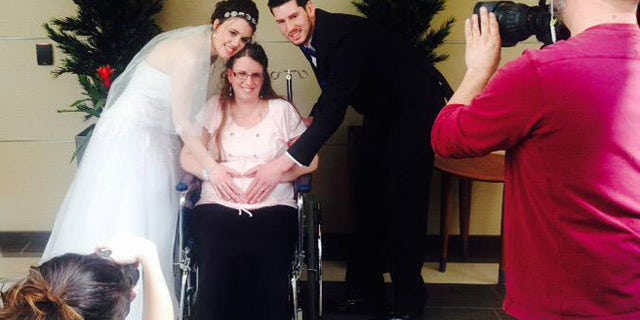 Natalie Lee, left, and her pregnant mother, Amy.