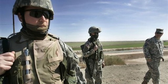 In this March 2, 2007 file photo, Tennessee National Guard Sgt. Phillip Williams of Gatlinburg stands guard near the Mexican border in Yuma, Ariz. (AP)