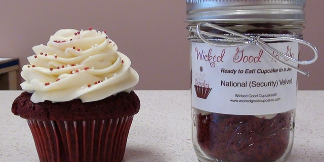 A red velvet cupcake along with the newly minted National (Security) Velvet from Wicked Good Cupcakes.