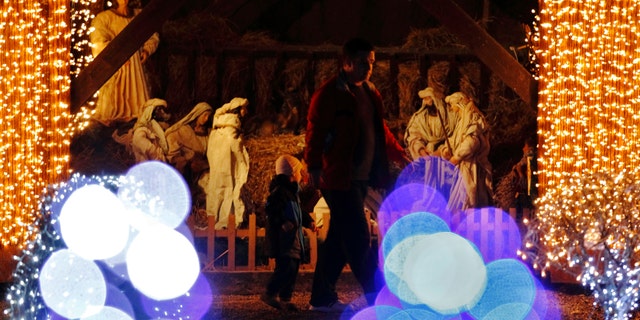 File photo - a lit up nativity scene is seen at a country house estate in the village of Grabovnica near Cazma, central Croatia, Dec. 10, 2011. (REUTERS/Nikola Solic)