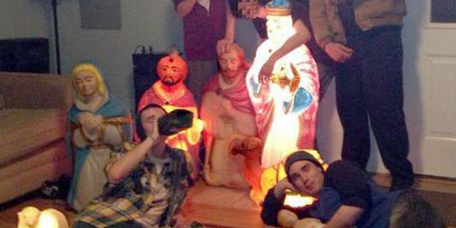This undated photo shows the nativity scene and the teens charged with stealing it.