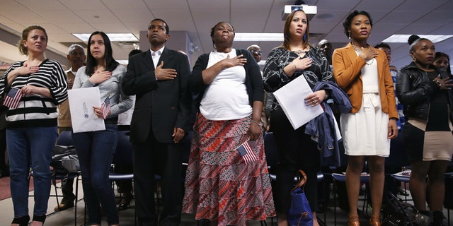 A naturalization ceremony at the U.S. Citizenship and Immigration Services (USCIS), office on May 17, 2013 in New York City.