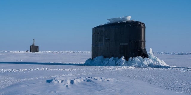 The submarine USS Connecticut and fast-attack submarine USS Hartford breakthrough the ice in support of Ice Exercise 2018 near Ice Camp Skate in the Arctic Circle, March 10, 2018.