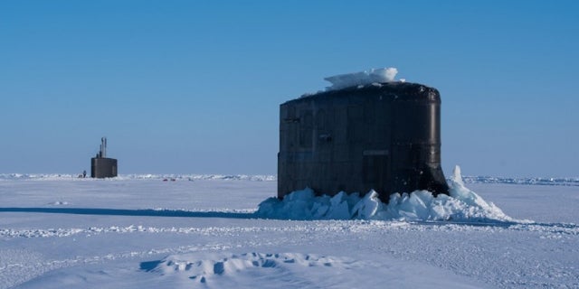 The submarine USS Connecticut and fast-attack submarine USS Hartford breakthrough the ice in support of Ice Exercise 2018 near Ice Camp Skate in the Arctic Circle, March 10, 2018.