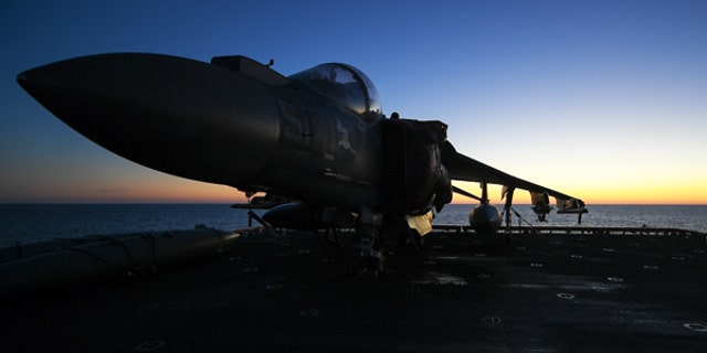 170125-N-AV754-015
ATLANTIC OCEAN (Jan. 25, 2017) An AV-8B Harrier II sits on an aircraft elevator aboard the amphibious assault ship USS Bataan (LHD 5). The ship is underway conducting a composite training unit exercise with its amphibious ready group in preparation for an upcoming deployment. (U.S. Navy photo by Mass Communication Specialist 3rd Class Evan Thompson/Released)