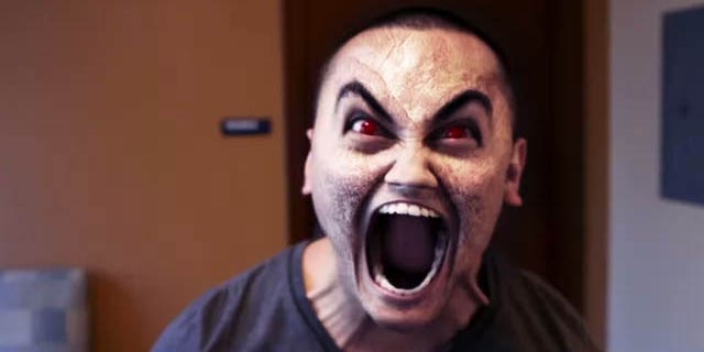 This is a screen shot of a scene in the video when the service member, under the influence of bath salts, returns to his dorm room and believes his roommate has turned demonic.
