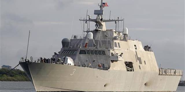 In this file photo from September 17, 2012, the littoral combatant USS Forth Worth arrives at the port of Galveston, Texas to prepare for its official commissioning ceremony.
