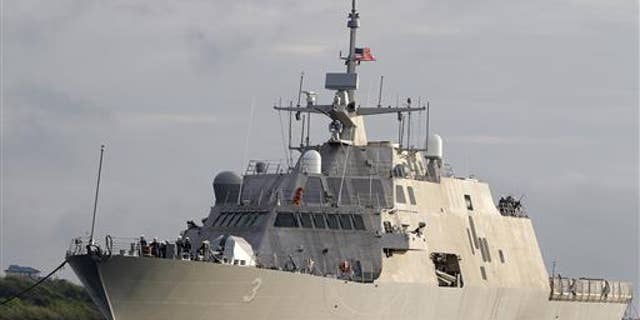 In this Sept. 17, 2012, file photo, the littoral combat ship USS Forth Worth arrives at the port of Galveston, Texas, to prepare for its formal commissioning ceremony.