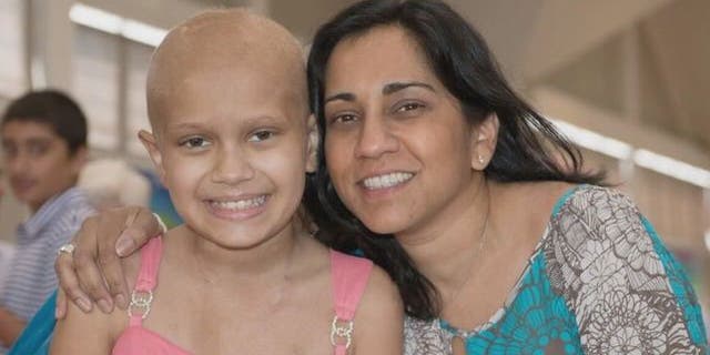Amy Summy is pictured with her daughter, Naya, who she is honoring through #TheMustardChallenge campaign.