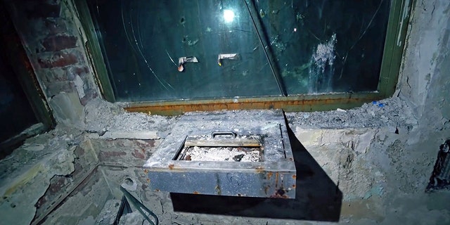 PICS BY WARREN URBEX / CATERS NEWS - (PICTURED: Smattered with bullets, this is the control room where it is believed allied forces raided the location - bullets still are lodged in the bullet proof glass several inches thick) - An urban explorer has revealed abandoned German tunnels claimed to lead to a secret Nazi weapons testing bunker. After hunting through miles of underground passageways, Warren Tepper, from Hampshire, was shocked by his discovery after climbing through a hole in one of the walls. It is claimed the area was a shelter for Nazis during the bombing from Allied forces and also a bombardment system, where ammunition was tested on steel plates. Inside Warren and co-explorer Matt, found four-inch-thick bullet holes in metal along with similar holes in bulletproof glass, believed to have been from when Americans raided the site. The bunker and surrounding tunnels, that lie beneath Duisburg, Germany, could also have been visited by Adolf Hitler and used as a spot for secret meetings.