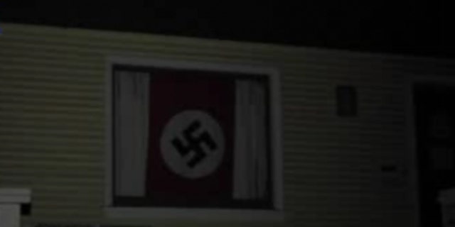 The flag was on display as of late Thursday in a home on U Street between 25th and 26th streets in Sacramento, KTXL reports.  (KTXL/Fox40.com)