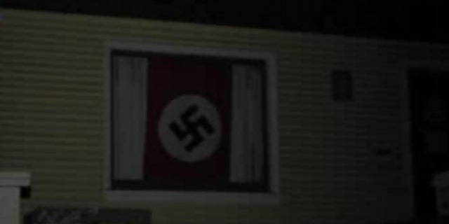 The flag was on display as of late Thursday in a home on U Street between 25th and 26th streets in Sacramento, KTXL reports. (KTXL/Fox40.com)