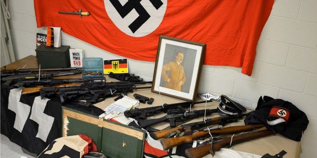 June 16, 2016: This image shows weapons and Nazi paraphernalia seized from a home in Mount Sinai, N.Y.