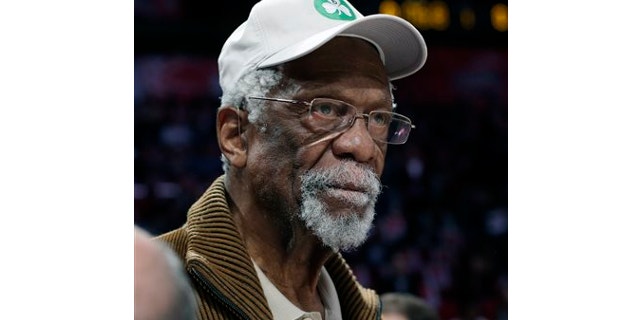 FILE: Feb. 16, 2013: Former Boston Celtis' Bill Russell watches the NBA All-Star Saturday Night basketball competition in Houston. Russell was arrested Oct. 16, 2013 as he attempted to go through security.