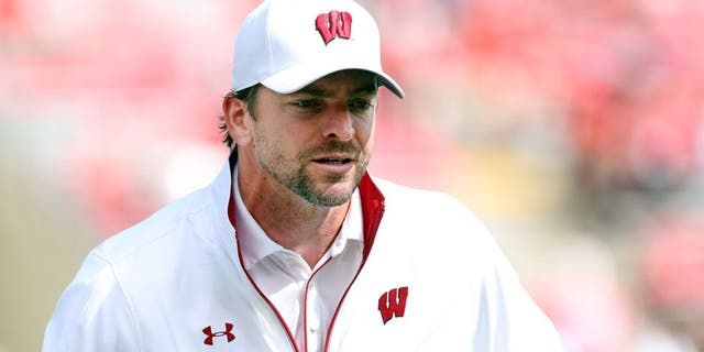 Sep 10, 2016; Madison, WI, USA; Wisconsin Badgers defensive coordinator Justin Wilcox watches his squad practice before the game with the Akron Zips at Camp Randall Stadium. Wisconsin defeated Akron 54-10. Mandatory Credit: Mary Langenfeld-USA TODAY Sports