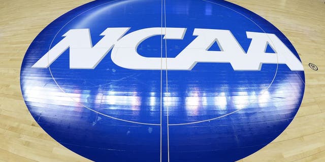 CHARLOTTE, NC - MARCH 22: A view of the NCAA logo at mid-court prior to a game between the Michigan State Spartans and the Virginia Cavaliers during the third round of the 2015 NCAA Men's Basketball Tournament at Time Warner Cable Arena on March 22, 2015 in Charlotte, North Carolina. Michigan State won 60-54. (Photo by Lance King/Getty Images)