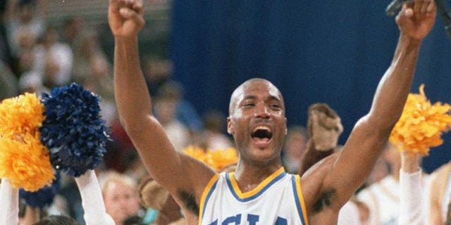 April 3, 1995: UCLA's Ed O'Bannon celebrates after his team won the championship NCAA game against Arkansas in Seattle.