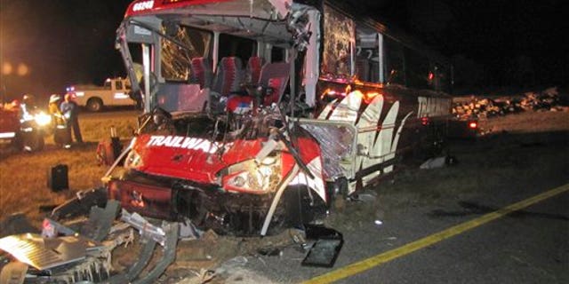 Oct. 6: This photo provided by the Nebraska State Patrol shows a Burlington Trailways bus that crashed into a semi on Interstate 80 near Gibbon, Neb. Five people were treated at hospital after the Denver-bound bus rammed into an overturned semitrailer on Interstate 80 near Gibbon, Neb., early Thursday.