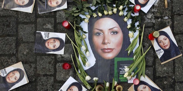 Pictures of the Iranian woman Neda Agha-Soltan, who was killed during a post election anti-government protest, are placed on Albertina Square during a demonstration in Vienna January 23, 2010. Agha-Soltan became a symbol for protests against Tehran's hardline leaders after graphic footage of her death was seen around the world on the Internet. (Reuters)