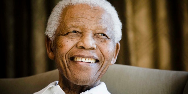 June 2, 2009: Former South African President Nelson Mandela reacts at the Mandela foundation, in Johannesburg, South Africa, during a meeting with a group of American and South African students as part of a series of activities leading to Mandela Day on July 18th.