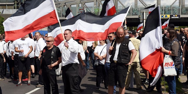 Far-right extremists gather to commemorate the death of Nazi Rudolf Hess in Berlin's Spandau district on Saturday.