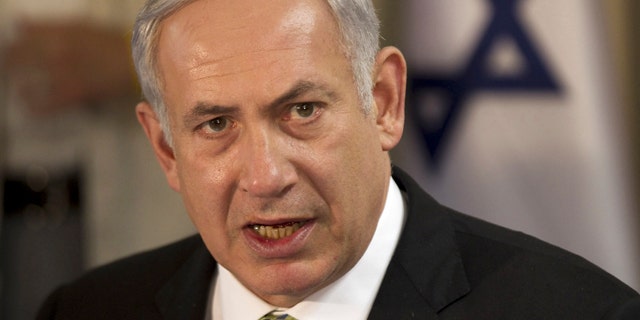 Oct. 30, 2011: Israeli Prime Minister Benjamin Netanyahu heads the weekly cabinet meeting convening in Safed, northern Israel.