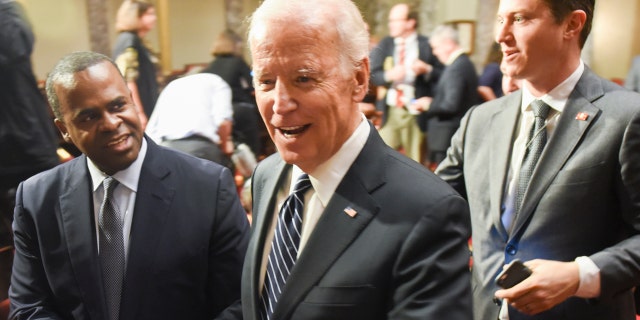Vice President Joe Biden leaves the the Old Senate Chamber following a mock swearing in ceremony on Capitol Hill in Washington, Tuesday, Jan. 3, 2017, as the 115th Congress begins. (AP Photo/Kevin Wolf)