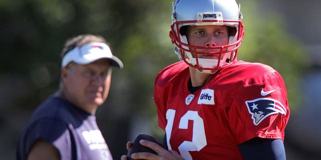 FOXBOROUGH, MA - AUGUST 23: New England Patriots quarterback Tom Brady (12) is back on the field at Gillette Stadium in Foxborough, Mass., on Aug. 23, 2016, under the watchful eye of New England Patriots head coach Bill Belichick after a two day excused absence. (Photo by Barry Chin/The Boston Globe via Getty Images)