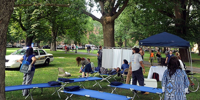 Cots were set up Thursday as a makeshift treatment center on the New Haven Green to handle the drug overdoses.